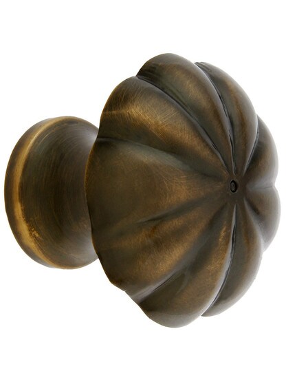 Melon Style Cabinet Knob - 1 1/4 inch Diameter in Antique Brass.